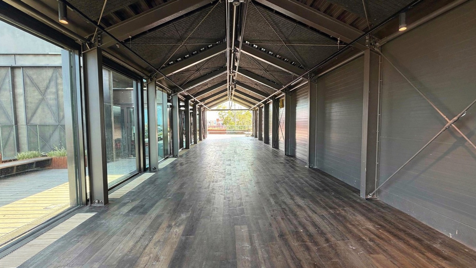 The Pavilion, a glass greenhouse-style structure on the rooftop